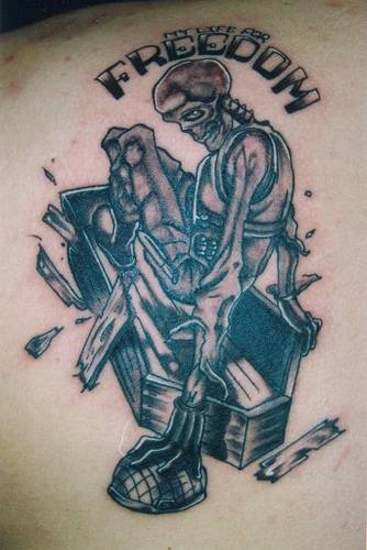 Grey Ink Skeleton Coffin Freedom Tattoo On Left Back Shoulder