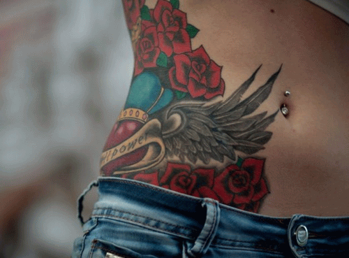 Heart With Wings And Roses Tattoo On Side Belly