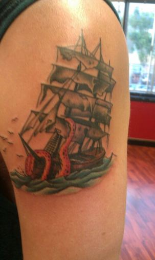 Kraken Pulling Ship Tattoo On Shoulder