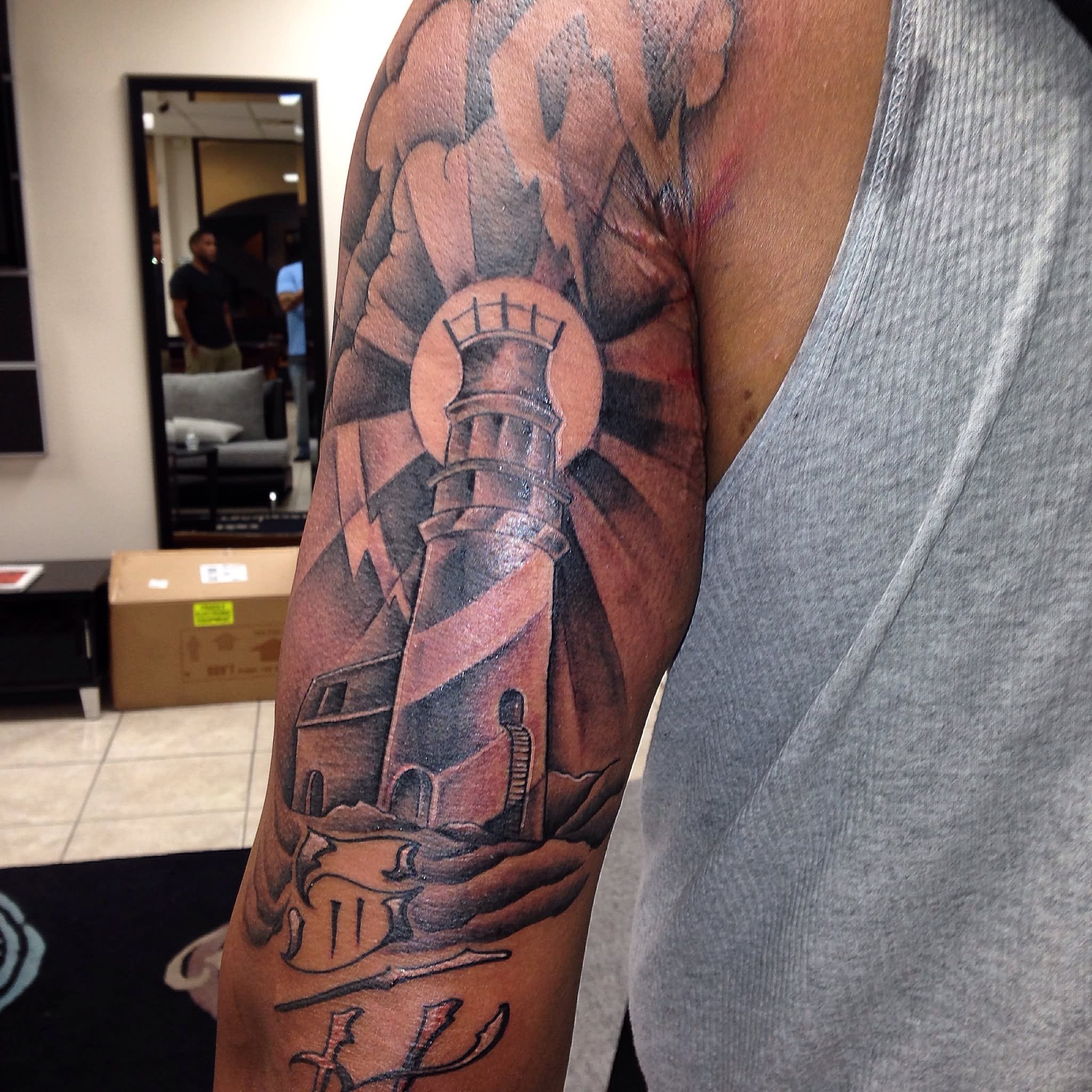 Left Half Sleeve Lighthouse Tattoo