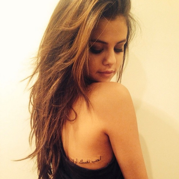 Lettering Tattoo On Celebrity Selena Gomez Back
