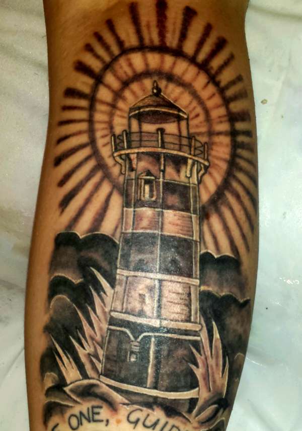 Lighthouse Tattoo On Back Leg