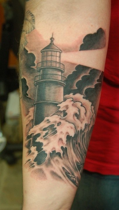Lighthouse Tattoo On Man Left Forearm