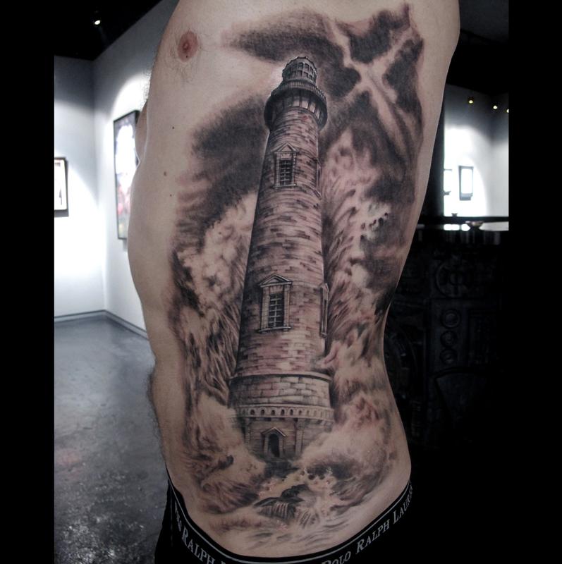 Lighthouse Tattoo On Side Rib by Stefano Alcantara