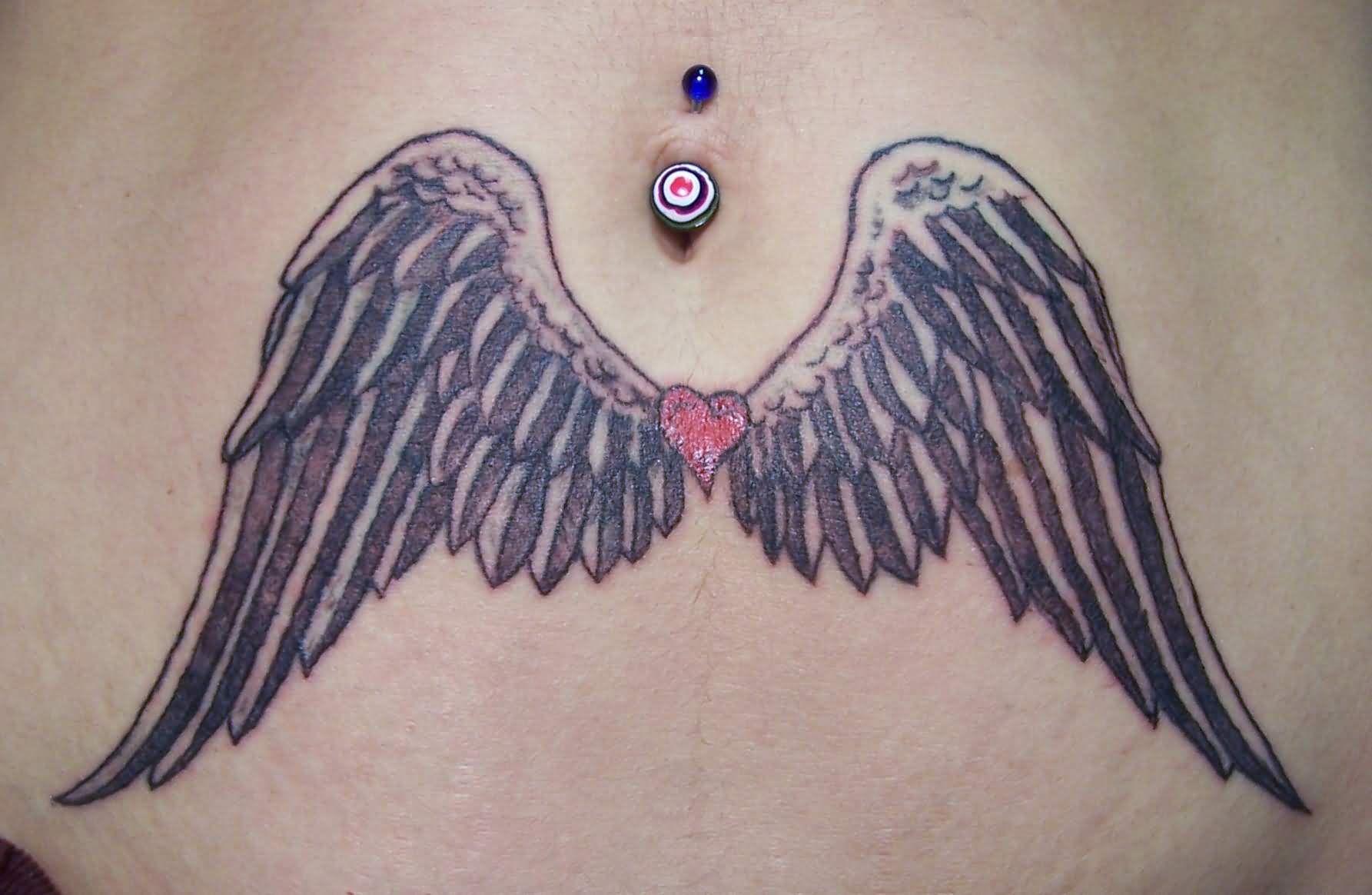 Little Heart With Wings Tattoo On Belly