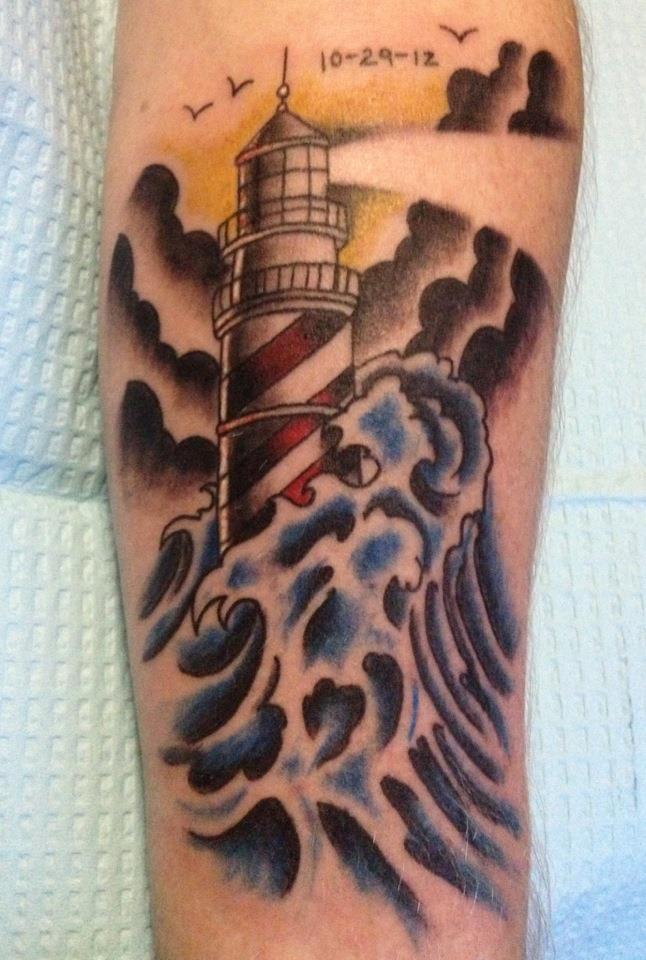 Memorial Clouds And Lighthouse Tattoo On Arm Sleeve