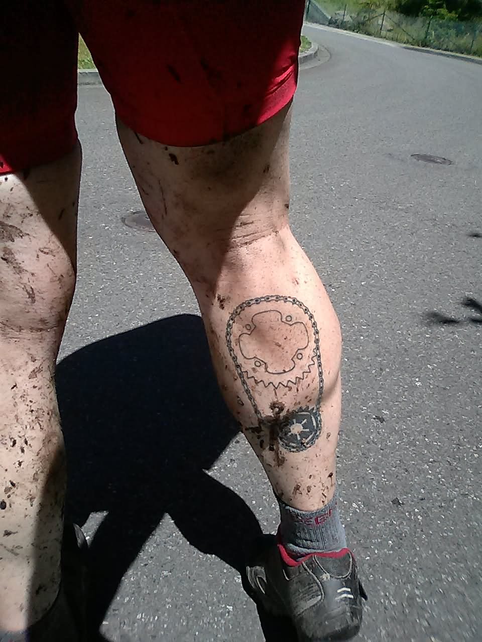 Mountain Bike Sprocket With Chain Tattoo On Man Leg Calf