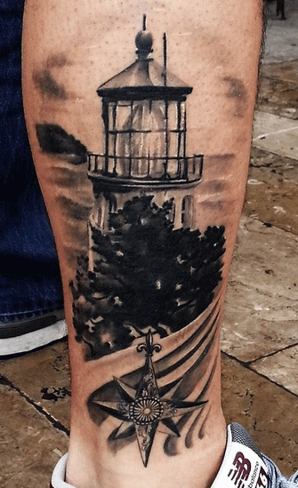 Nautical Star And Lighthouse Tattoo On Leg