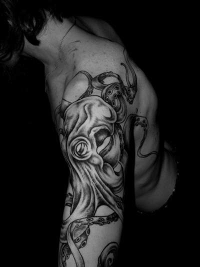 Nice Grey Octopus Tattoo On Left Half Sleeve