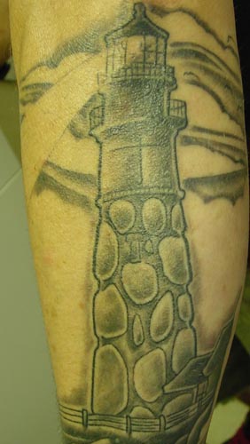 Nice Grey Stone Lighthouse Tattoo