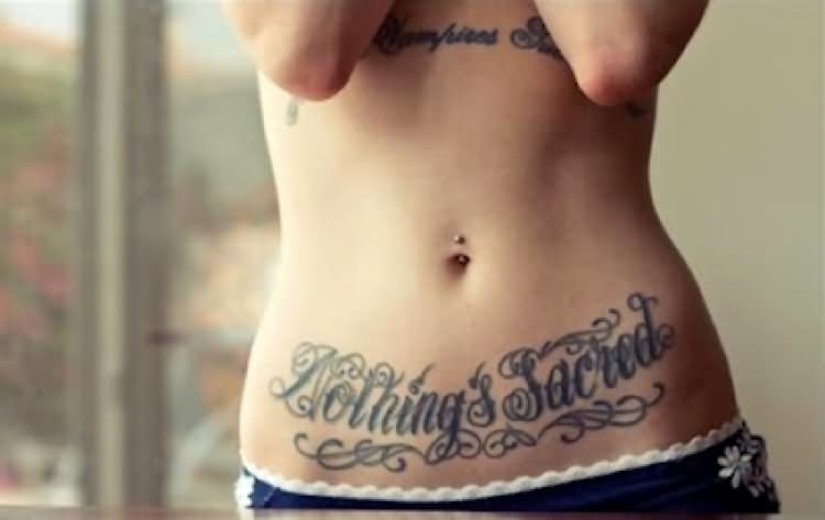 Nothing's Sacred Lettering Tattoo On Belly