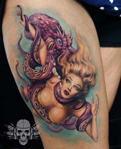 Octopus Caught Women Tattoo On Thigh by Tattooed Theory