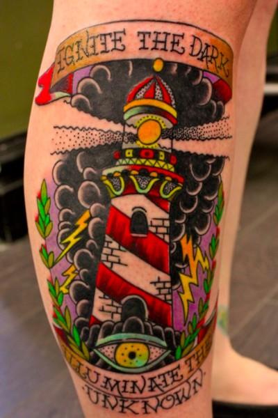 One Light Lighthouse Tattoo On Right Leg