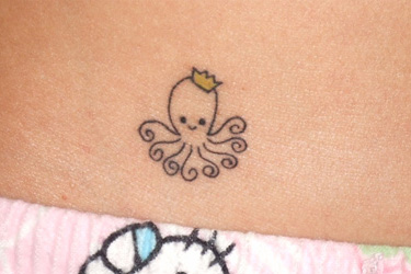 Outline Cute Octopus Tattoo On Hip