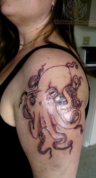 Outline Octopus Tattoo On Girl Left Shoulder