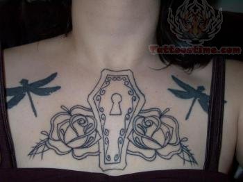 Outline Rose Flowers And Coffin Tattoo On Chestpiece