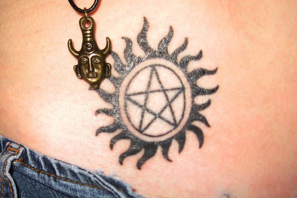 Pentagram In Sun Tattoo Design For Belly