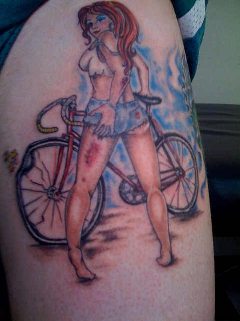 Pin Up Girl With Bike Tattoo Design
