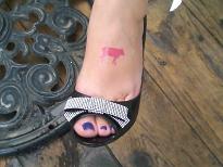 Pink Cow Tattoo On Girl Foot