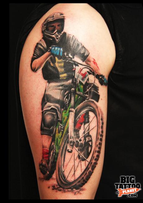 Realistic Man Riding Mountain Bike Tattoo Design For Half Sleeve