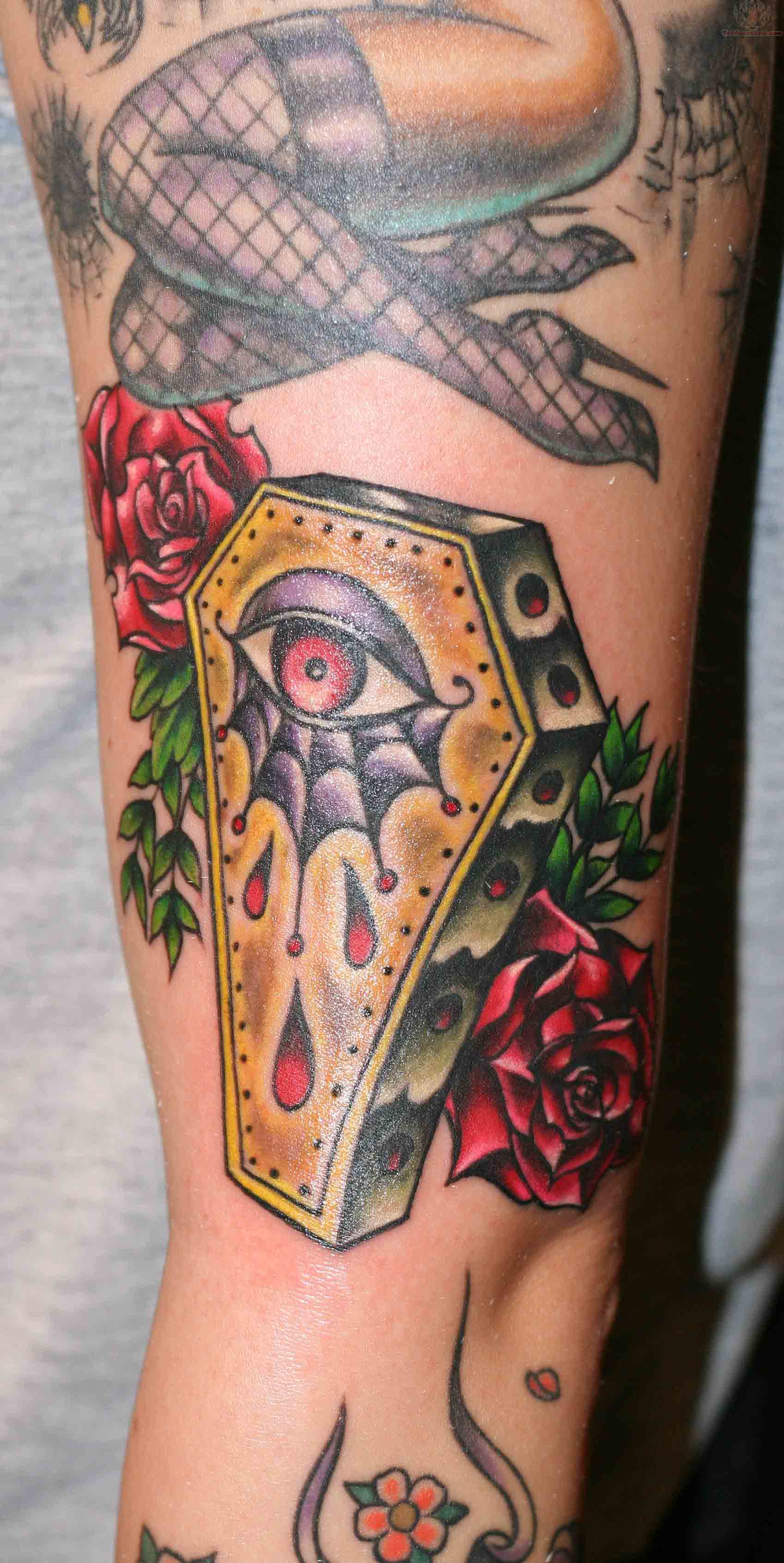 Red Roses And One Eyed Coffin Tattoo