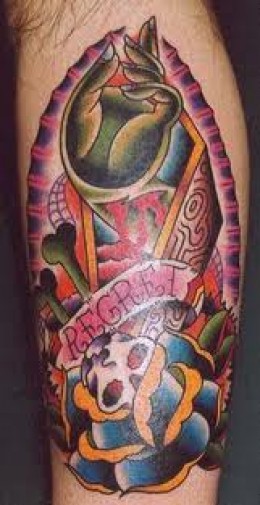 Regret Banner And Coffin Tattoo On Leg