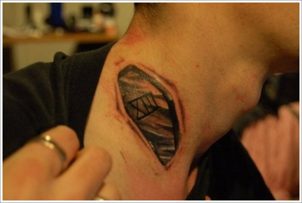 Ripped Skin Coffin Tattoo On Side Neck