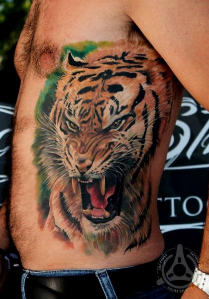 Roaring Tiger Head Tattoo On Man Side Belly