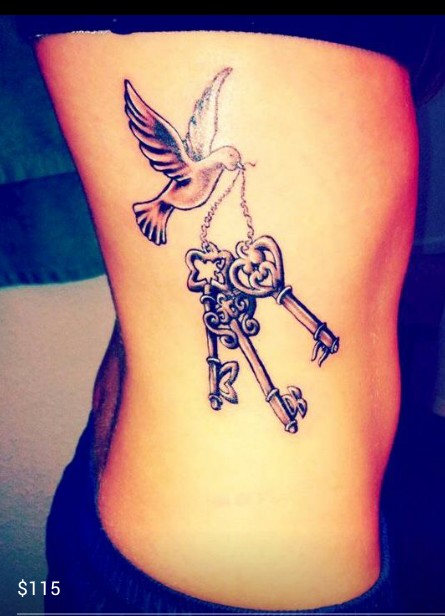 Rosary Keys In Bird Beak Tattoo On Side Belly