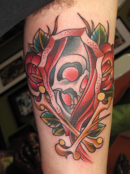Roses And Coffin Tattoo On Bicep