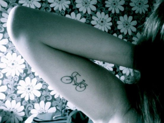 Simple Bike Tattoo On Girl Right Bicep