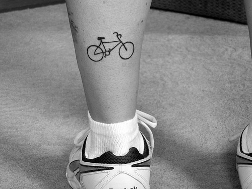 Simple Black Bike Tattoo On Leg