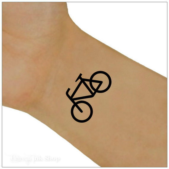 Simple Black Bike Tattoo On Wrist