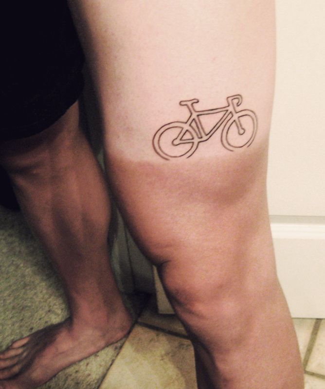 Simple Black Outline Bike Tattoo On Thigh
