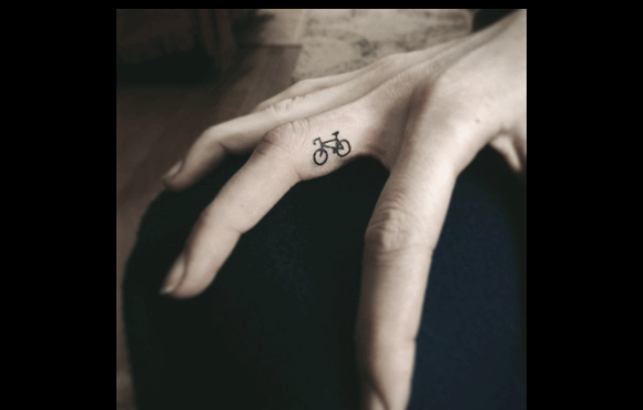 Simple Little Bike Tattoo On Finger