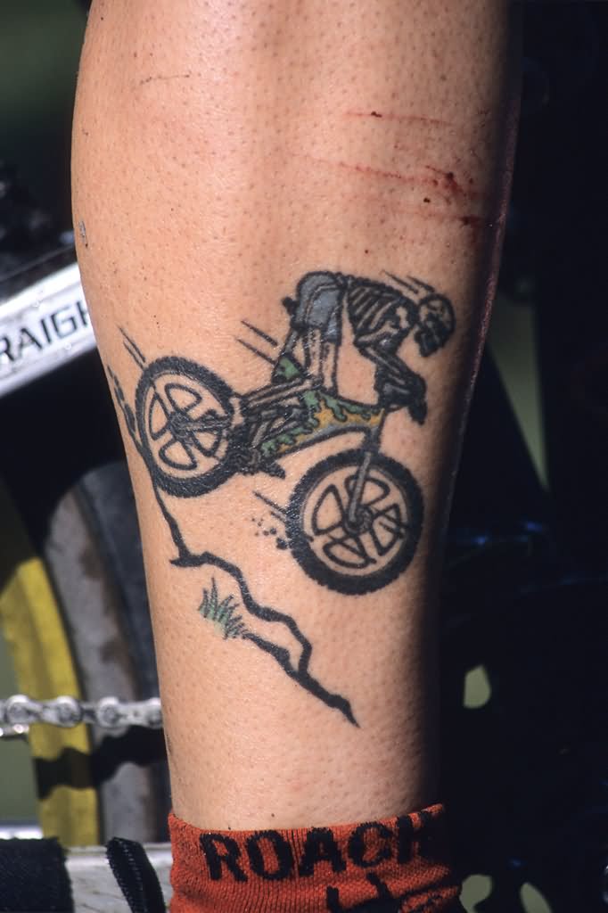 Skeleton Riding Mountain Bike Tattoo On Leg Calf