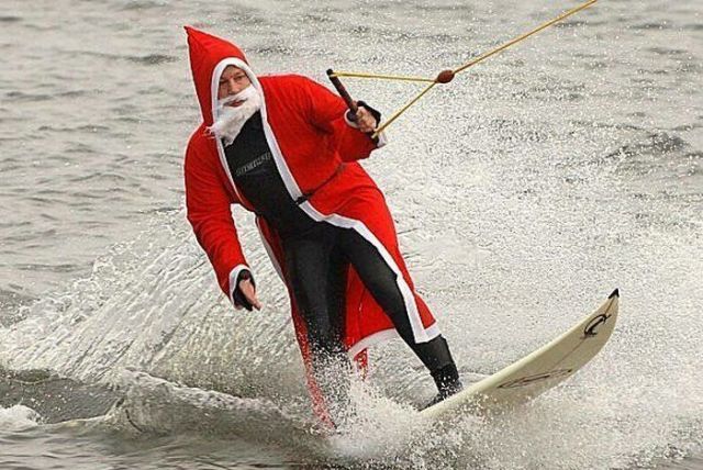 Surfing Santa Funny Picture