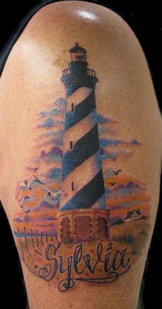 Sylvia Lighthouse Tattoo On Half Sleeve