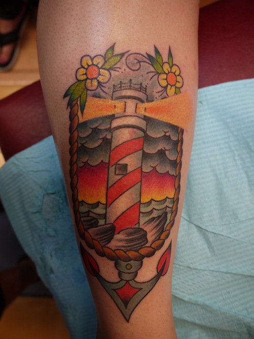 Traditional Anchor And Lighthouse Tattoo On Leg