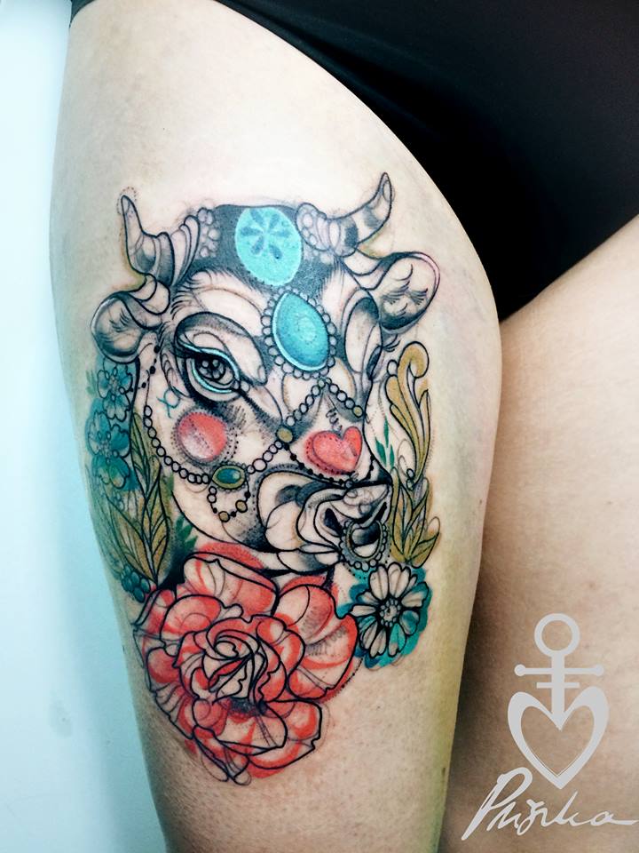 Traditional Cow Head With Flowers Tattoo On Thigh