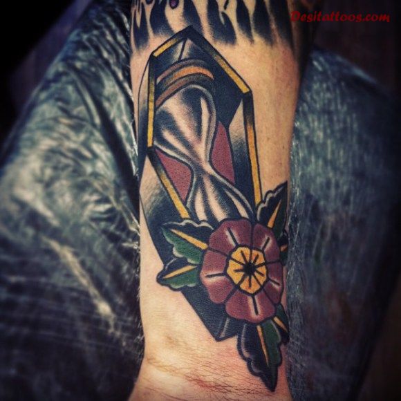 Traditional Flower And Hourglass Coffin Tattoo