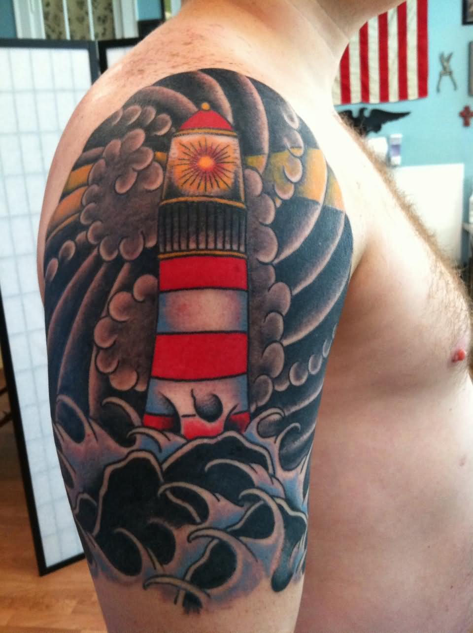 Traditional Lighthouse Tattoo On Man Right Half Sleeve