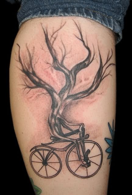Tree Without Leaves Riding Bike Tattoo On Leg Calf