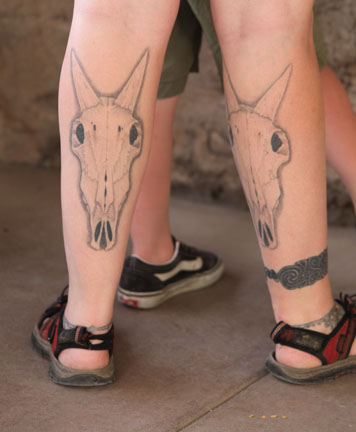 Two Cow Skull Tattoo On Both Leg Calf