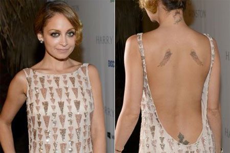 Two Feather Tattoo On Celebrity Nichole Richie Upper Back