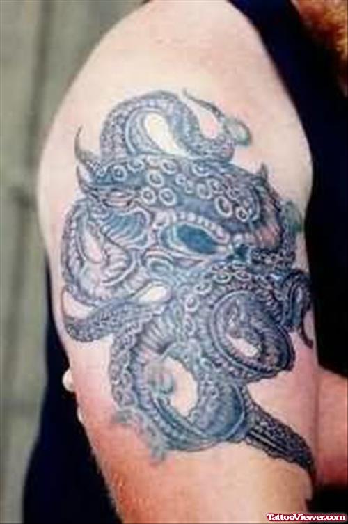 Unique Aqua Octopus Tattoo On Right Half Sleeve