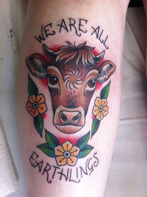 We Are All Earthlings - Traditional Cow Head With Flowers Tattoo Design