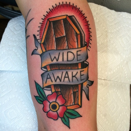 Wide Awake Banner And Coffin Tattoo
