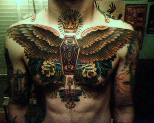 Winged Coffin Tattoo On Man Chest