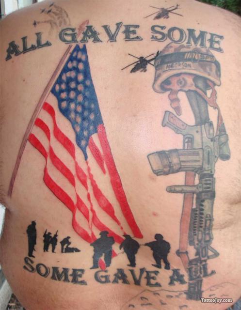 Army Equipment With USA Flag And Soldier Tattoo On Man Back